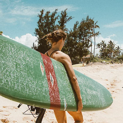 Lady with surfboard, Maui